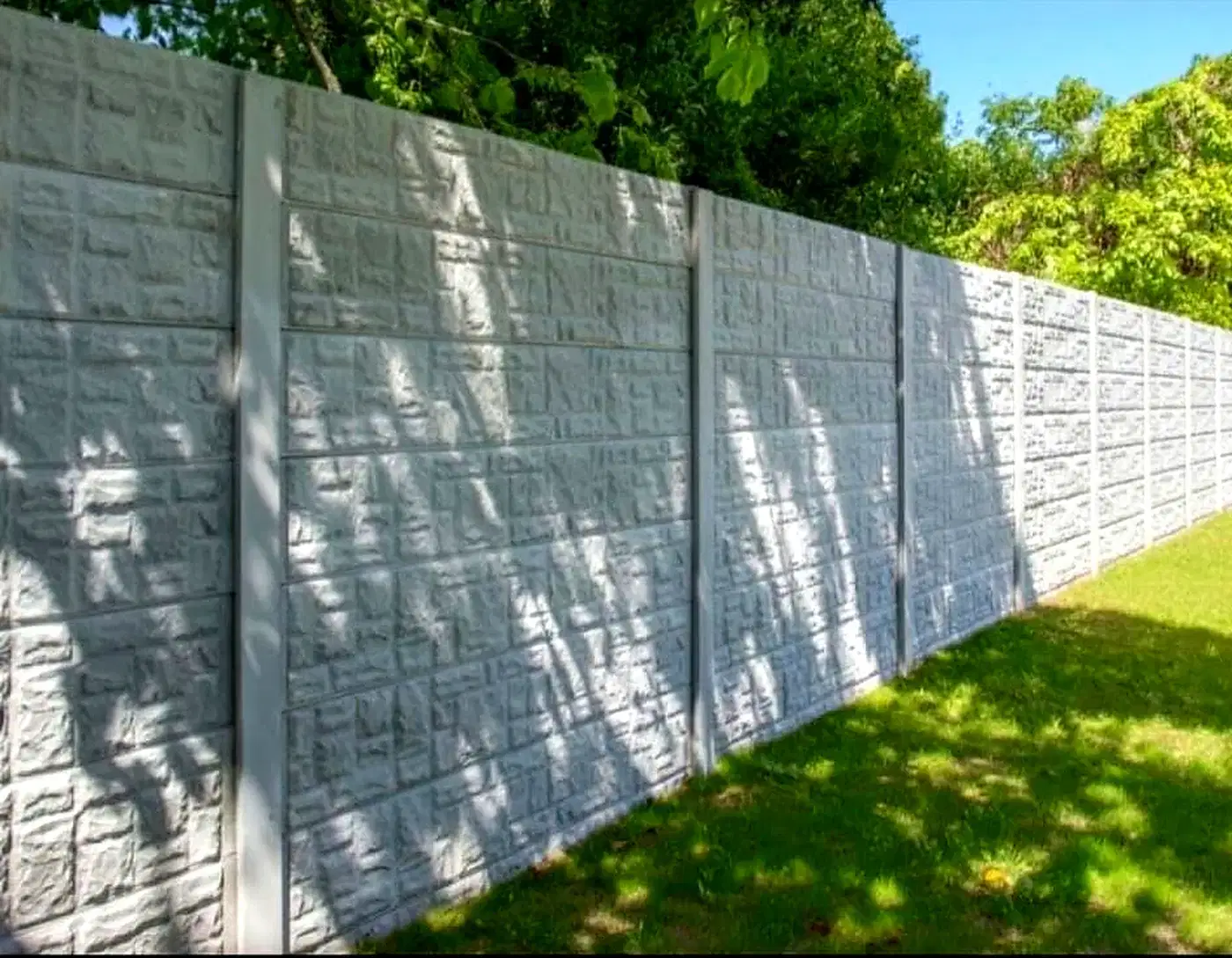 Textured Concrete Boundary Fence